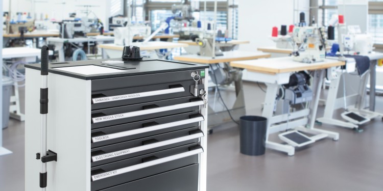 INH needle dispensing trolley in a sewing plant